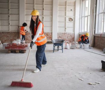 Female construction worker working on construction site Female construction worker working on construction site